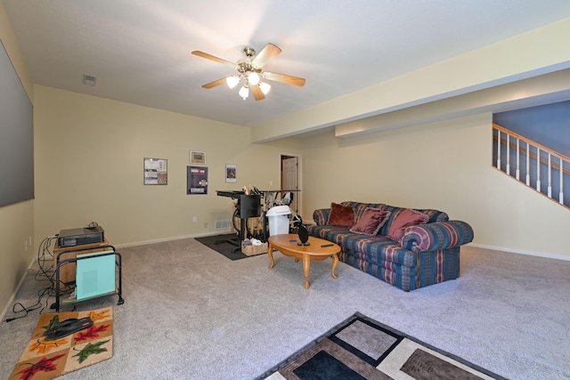 living area with baseboards, visible vents, ceiling fan, stairway, and carpet floors