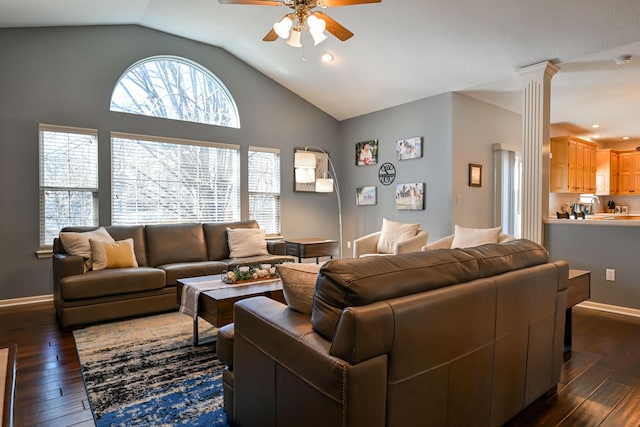 living area with dark wood-style flooring, decorative columns, vaulted ceiling, ceiling fan, and baseboards