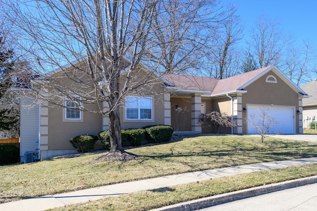 single story home with an attached garage, central air condition unit, driveway, stucco siding, and a front lawn