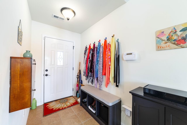 mudroom featuring visible vents and light tile patterned flooring