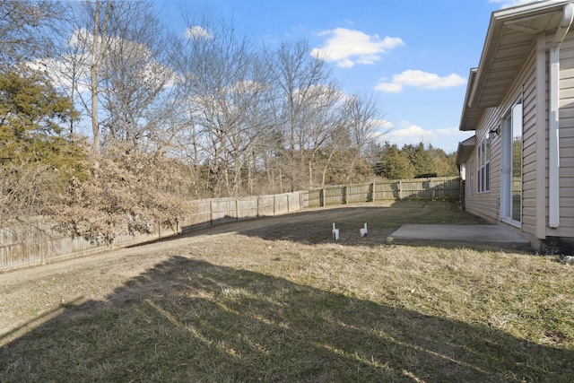 view of yard featuring a patio and a fenced backyard