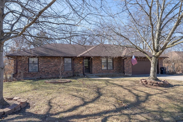 ranch-style house featuring an attached garage, brick siding, driveway, roof with shingles, and a front lawn