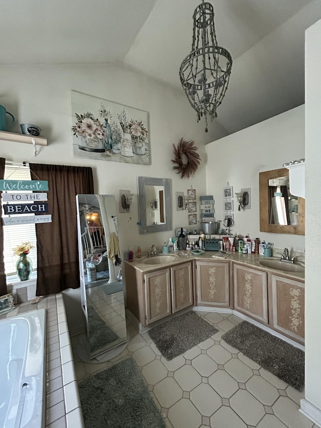 bathroom featuring vaulted ceiling, double vanity, a sink, and a washtub