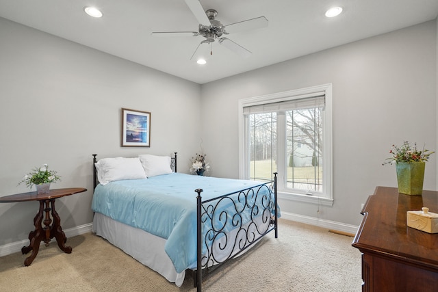 carpeted bedroom featuring visible vents, baseboards, ceiling fan, and recessed lighting