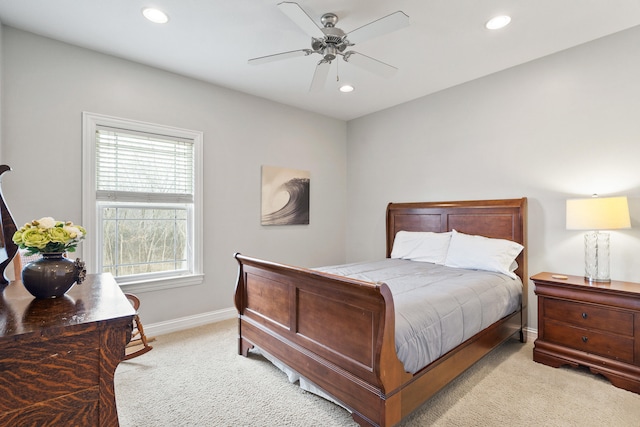 bedroom featuring baseboards, recessed lighting, a ceiling fan, and light colored carpet