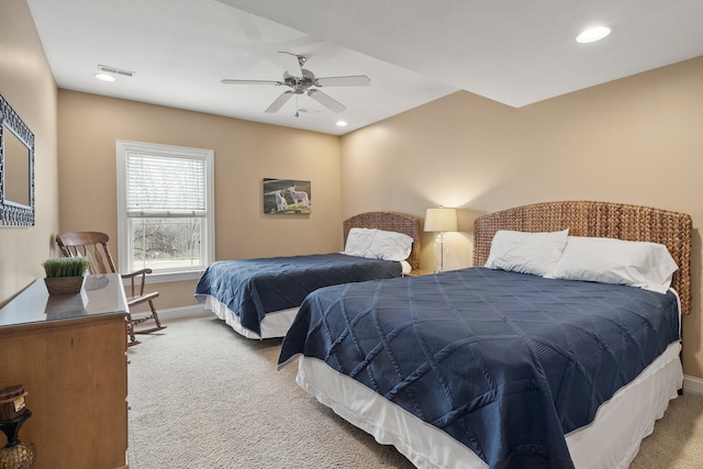 bedroom featuring carpet floors, recessed lighting, visible vents, and baseboards