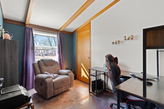 home office with vaulted ceiling with beams and wood finished floors