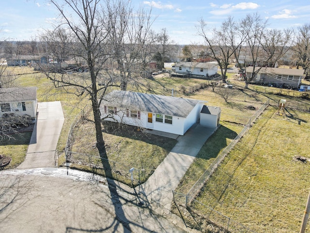 birds eye view of property with a residential view