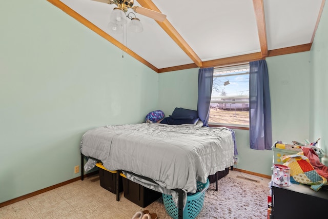 bedroom with lofted ceiling with beams, baseboards, and ceiling fan