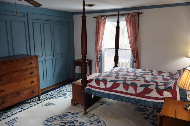 bedroom featuring visible vents and a closet