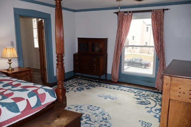 bedroom with ornamental molding