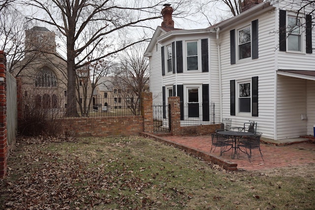 view of yard featuring a patio and fence