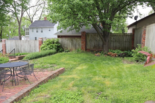 408 N Church St, Fayette, MO 65248 - fenced backyard with a patio