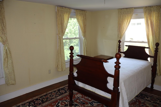 408 N Church St, Fayette, MO 65248 - bedroom featuring wood finished floors and baseboards