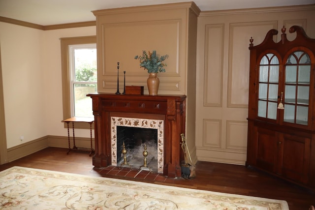 408 N Church St, Fayette, MO 65248 - living area with wood finished floors, a fireplace, and ornamental molding