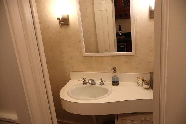 408 N Church St, Fayette, MO 65248 - bathroom with wallpapered walls and vanity