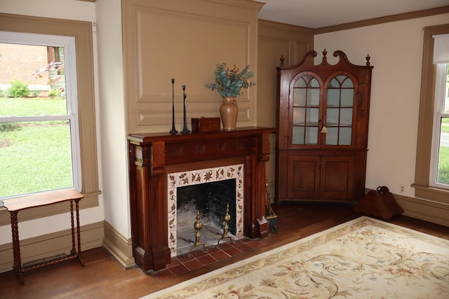408 N Church St, Fayette, MO 65248 - living area with wood finished floors, plenty of natural light, and ornamental molding