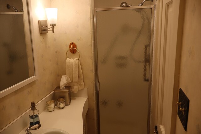 408 N Church St, Fayette, MO 65248 - bathroom with a stall shower, wallpapered walls, and vanity