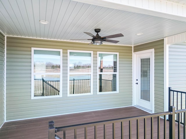 exterior space with ceiling fan