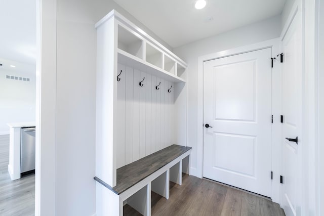 mudroom with visible vents and wood finished floors