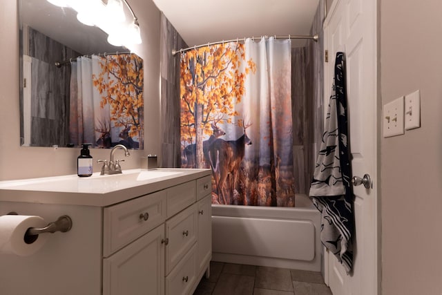 full bathroom with tile patterned floors, shower / tub combo, and vanity