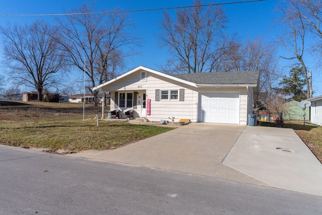 view of front of home featuring driveway, a front lawn, an attached garage, and a shingled roof