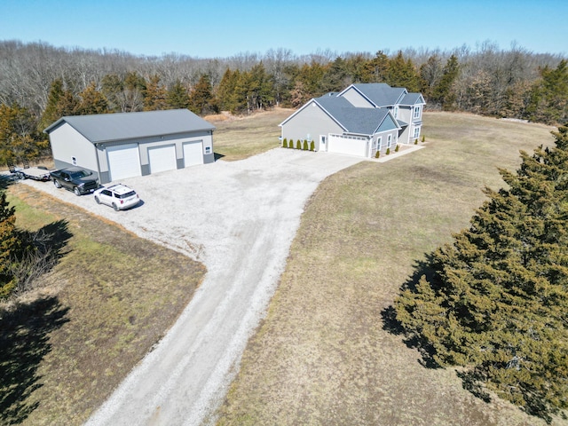 aerial view with a wooded view