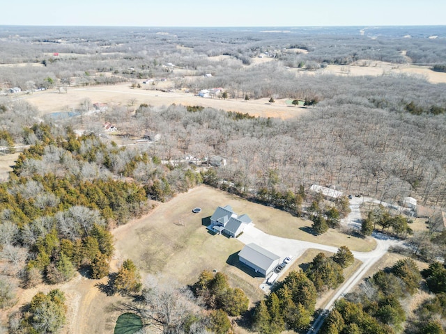 birds eye view of property featuring a rural view