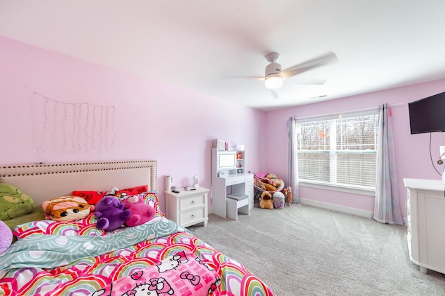 bedroom with ceiling fan, baseboards, visible vents, and light colored carpet