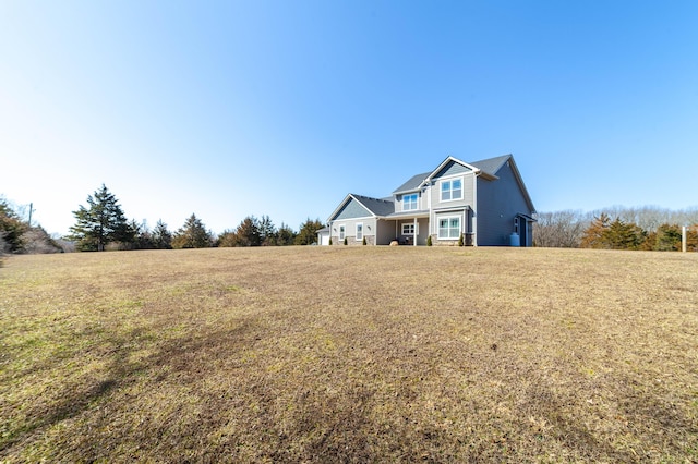 view of front of home with a front lawn