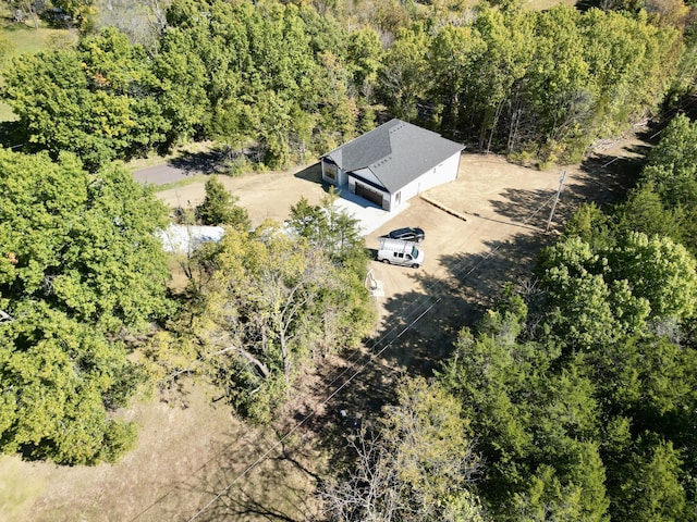 aerial view with a wooded view