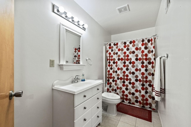 bathroom with visible vents, toilet, tile patterned floors, curtained shower, and vanity