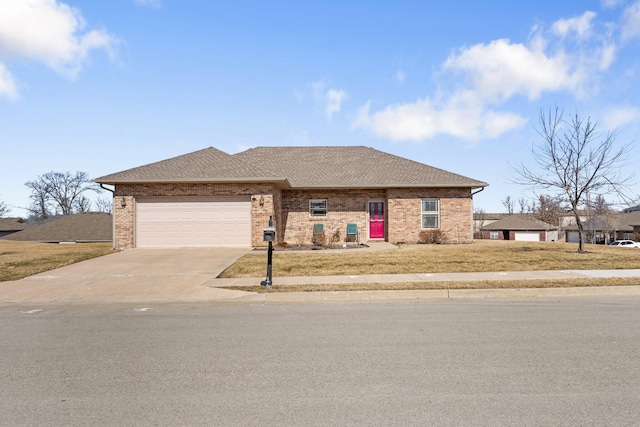 view of front facade with driveway, brick siding, a shingled roof, an attached garage, and a front yard