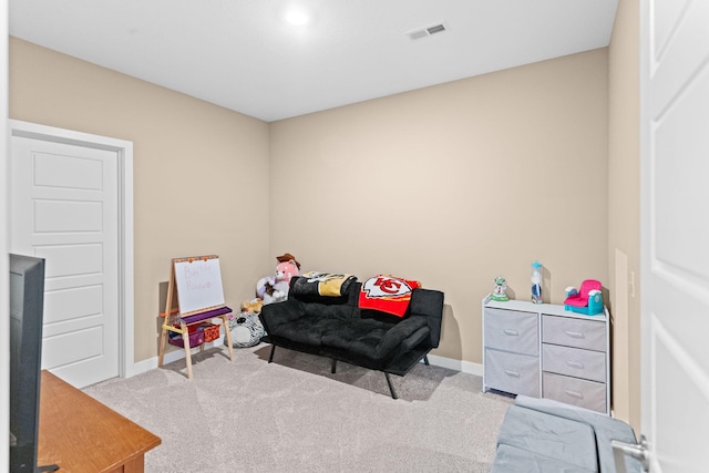 bedroom with visible vents, carpet flooring, and baseboards