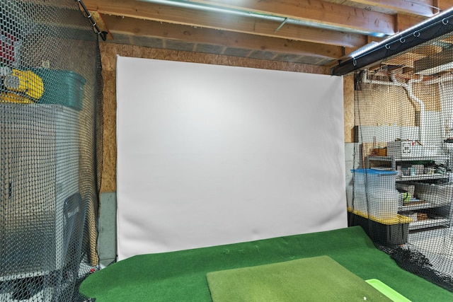 basement with golf simulator