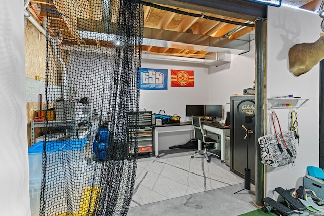 office area with concrete flooring