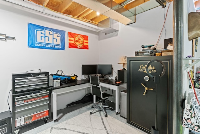 office area featuring concrete floors