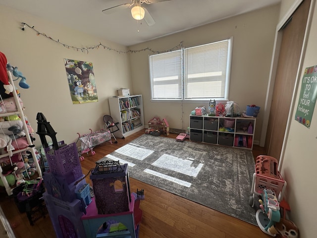 game room featuring ceiling fan and wood finished floors