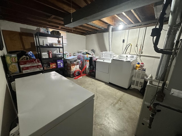 unfinished below grade area with fridge and washing machine and dryer