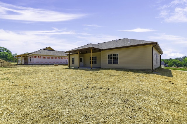 back of house featuring a patio