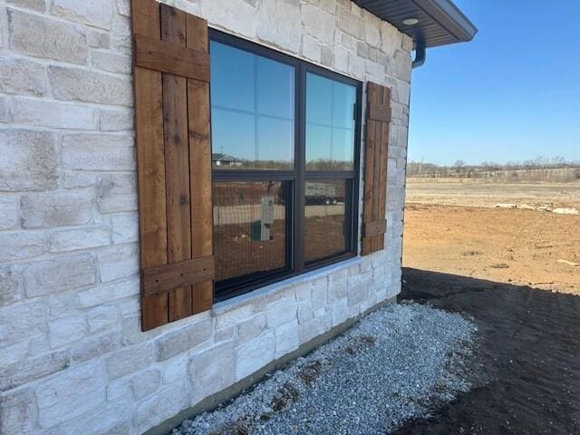 exterior details with stone siding