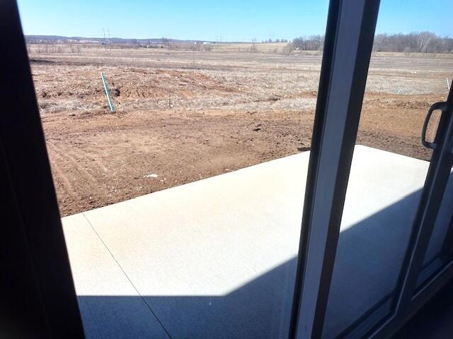 view of yard featuring a rural view