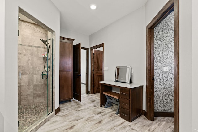 home office with recessed lighting, baseboards, and light wood-style floors