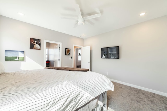 carpeted bedroom featuring ceiling fan, baseboards, and recessed lighting