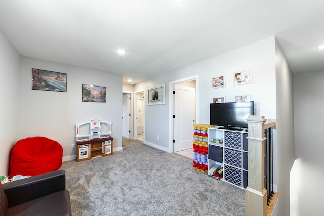 recreation room featuring baseboards, carpet flooring, and recessed lighting