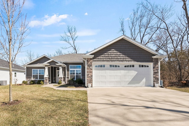 craftsman house with stone siding, driveway, an attached garage, and a front lawn