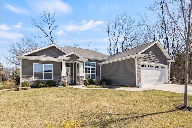 view of front of house featuring driveway, roof with shingles, a front lawn, a garage, and stone siding