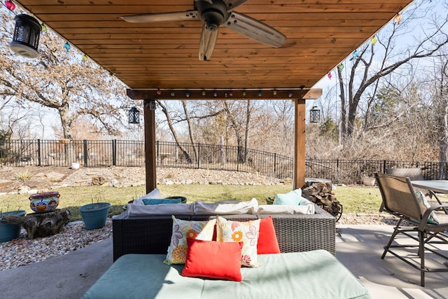 view of patio / terrace with a ceiling fan, a fenced backyard, outdoor lounge area, and outdoor dining space