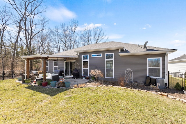 rear view of property with a lawn, a pergola, a patio, and fence