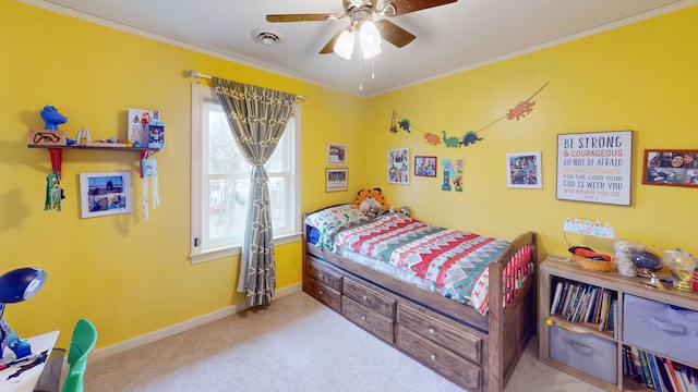 carpeted bedroom with visible vents, crown molding, baseboards, and ceiling fan